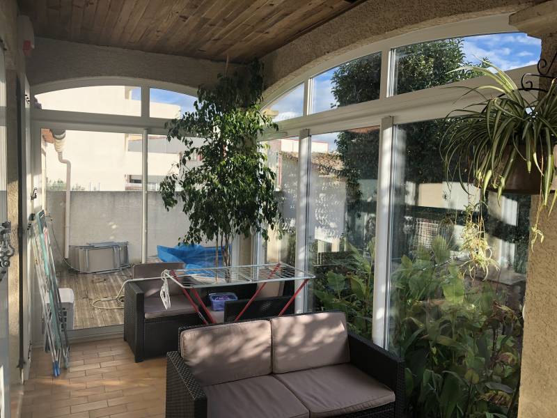 Fermeture de terrasse avec des baies coulissantes aluminium à Castelnau le lez