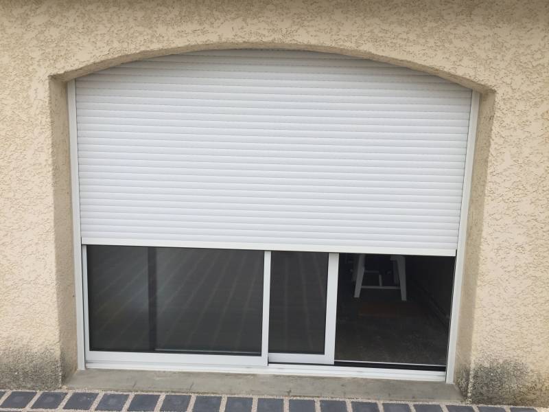 Remplacement d'une porte garage par une baie coulissante aluminium et bloc baie à Castries