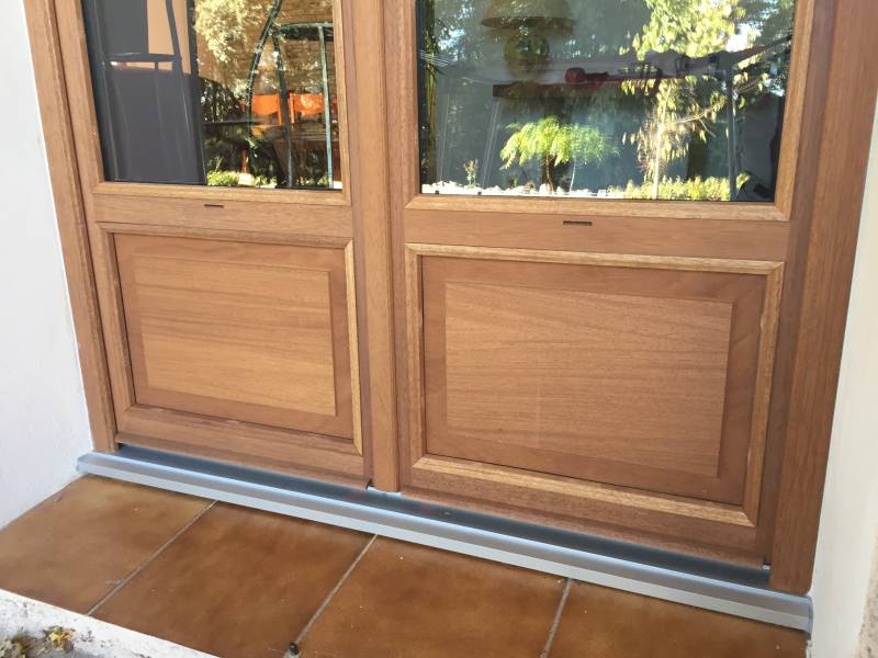 Porte fenêtre bois en rénovation