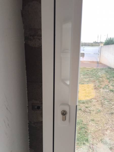 Fermeture intérieure à clé sur baie coulissante