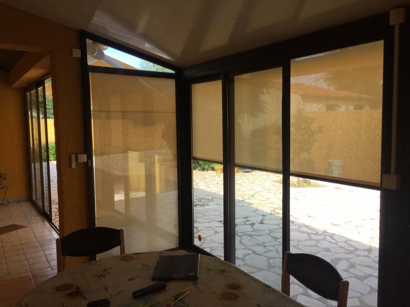 Pose de store pour véranda extérieur