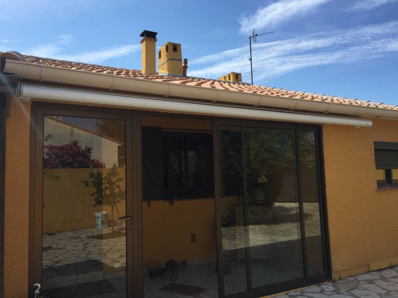 Pose de store pour véranda extérieur